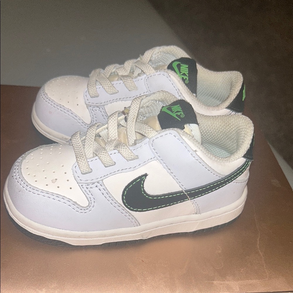 Nike White and Green Sneakers with Classic Low-Top Style